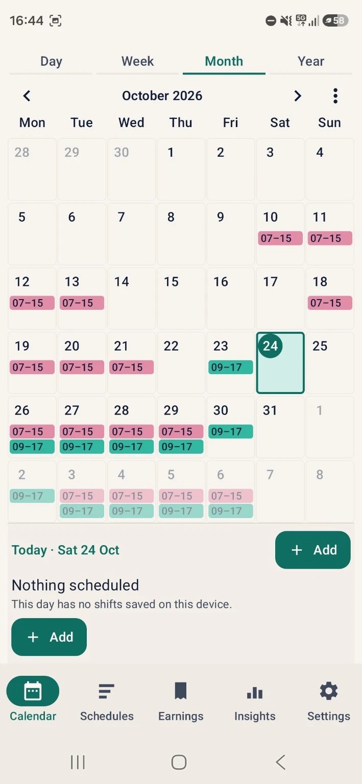 Shiftora month view with overlapping pink and teal shifts